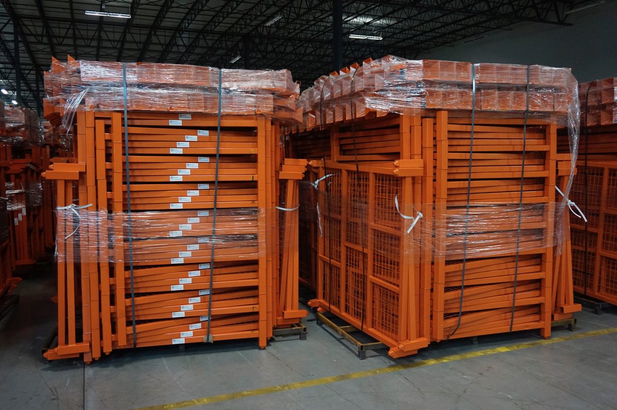 New orange stack racks palletized and ready for shipment