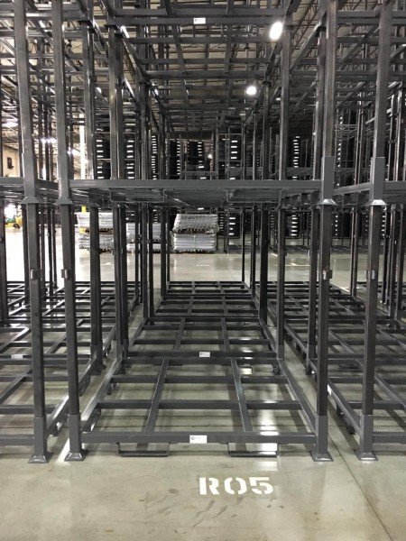 New portable steel stack racks in warehouse